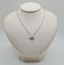 Collier Collier or blanc serti d’un pendentif HAI en diamants 58 Facettes
