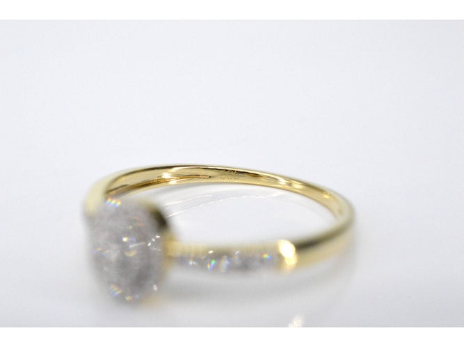 Bague Bague entourage en or avec diamants 58 Facettes 2100