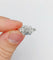 Bague 53 Bague art deco or blanc 18k ornée d'un diamant rond dans une monture géométrique finement travaillée (circa 1930) 58 Facettes A04979