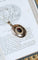Pendentif Pendentif médaillon ouvrant cabochon grenat et perles fines en or rose 18k 58 Facettes