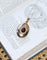 Pendentif Pendentif médaillon ouvrant cabochon grenat et perles fines en or rose 18k 58 Facettes