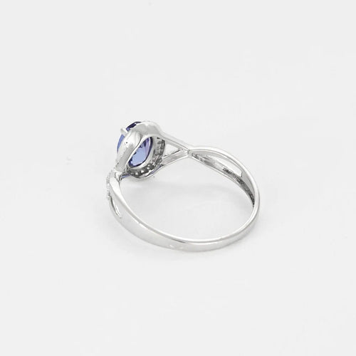 Bague 56 Bague tressée en or blanc 18K avec tanzanite et diamants 58 Facettes 58FC155