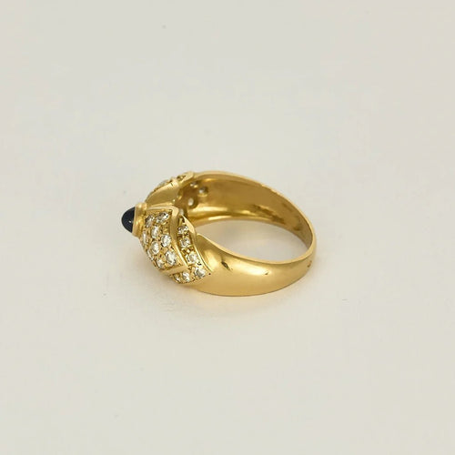 Bague 50 Bague nœud en or jaune 18K avec saphir cabochon et diamants 58 Facettes 58FC132