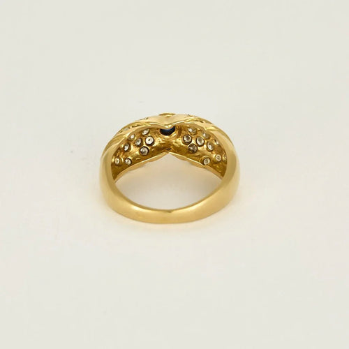 Bague 50 Bague nœud en or jaune 18K avec saphir cabochon et diamants 58 Facettes 58FC132