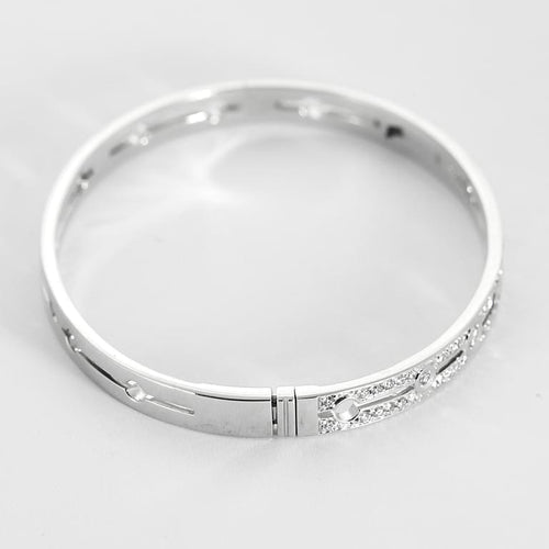 Bracelet Dinh Van Pulse - Bracelet rigide ouvrant en or gris pavé de diamants 58 Facettes 58FC161