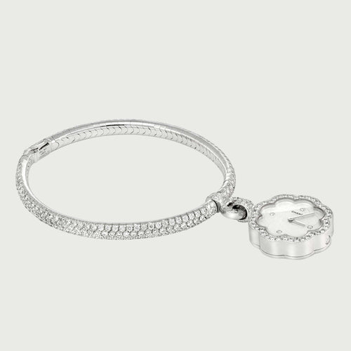 Montre Chanel Camélia - Montre Charm en or blanc et diamants 58 Facettes OC-68801959
