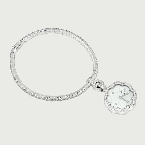 Montre Chanel Camélia - Montre Charm en or blanc et diamants 58 Facettes OC-68801959