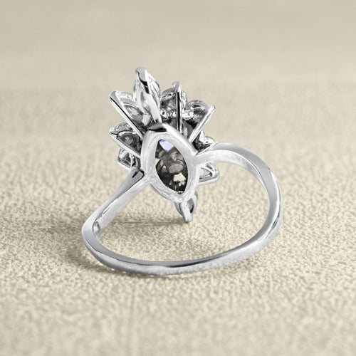 Bague 57 Bague marquise en or gris saphir et diamants 58 Facettes 61100105