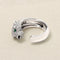 Bague 54 Cartier Panthère - Bague en or gris, émeraudes et diamants 58 Facettes 61E00495