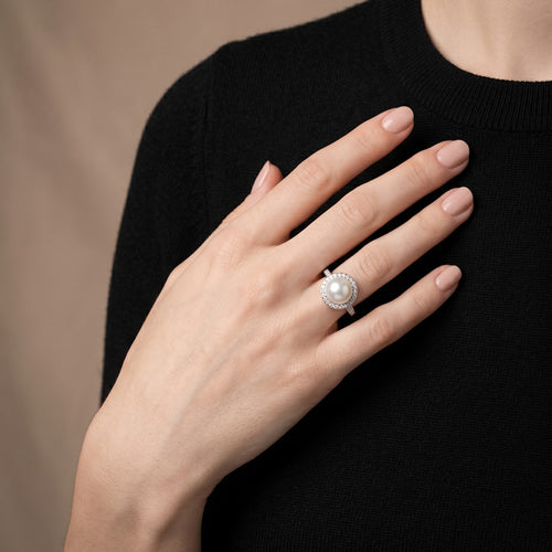 Bague 54 Bague en or gris, perle et diamants 58 Facettes 61400032