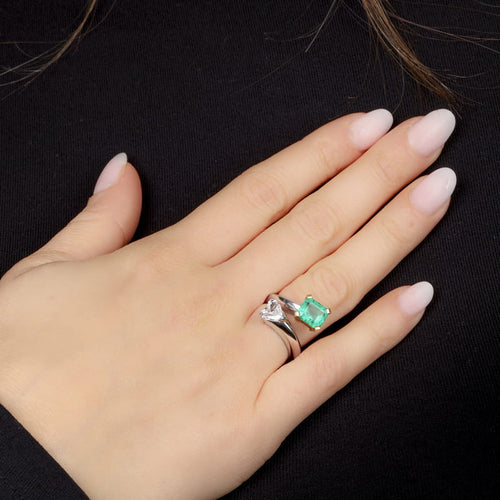 Bague 51 Bague en or gris, émeraude de Colombie et diamant 58 Facettes 61300002