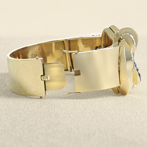 Boucles d'oreilles Bracelet jonc rigide à clip en or jaune 18 carats, diamants et saphirs 58 Facettes 62800064
