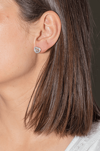 Boucles d'oreilles Chopard Happy Diamonds - Boucles d'oreilles cœur en or blanc et diamants 58 Facettes 4173784RV