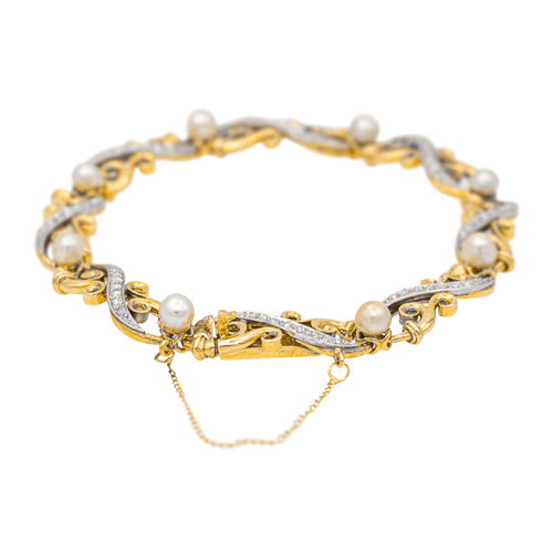 Bracelet Bracelet en or jaune et blanc, diamants et perles 58 Facettes 3785178CN