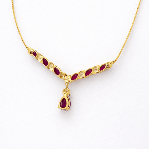 Collier Collier en or jaune 18 carats avec diamants et rubis 58 Facettes 34623
