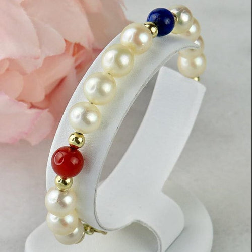 Bracelet Armband en perles, or 14 carats et pierres fines 58 Facettes 2306