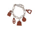 Bracelet Hermès Olga Amulette - Bracelet en cuir Barenia et acier palladié 58 Facettes 265386