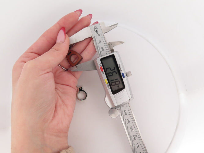 Bracelet Hermès Olga Amulette - Bracelet en cuir Barenia et acier palladié 58 Facettes 265386