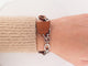 Bracelet Hermès Olga Amulette - Bracelet en cuir Barenia et acier palladié 58 Facettes 265386