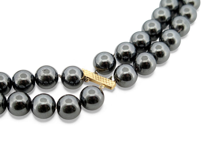 Collier Collier double rangs perles d'hématite noires en or jaune 18k et diamants 0,67 ct 58 Facettes 272071