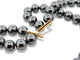 Collier Collier double rangs perles d'hématite noires en or jaune 18k et diamants 0,67 ct 58 Facettes 272071