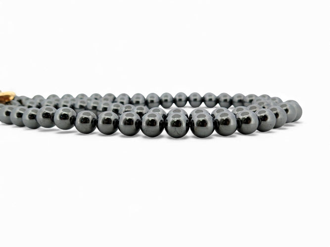 Collier Collier double rangs perles d'hématite noires en or jaune 18k et diamants 0,67 ct 58 Facettes 272071