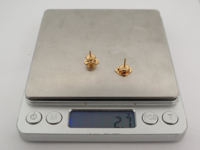 Boucles d'oreilles Poiray - Boucles d'oreilles Cœur Entrelacé émail rose en or jaune 18k 58 Facettes 270064