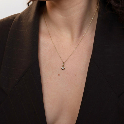 Pendentif Pendentif solitaire vintage en or jaune 14k et diamant brillant 58 Facettes 2601006