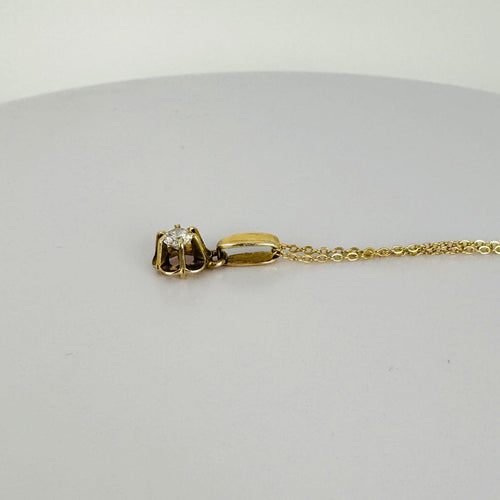 Pendentif Pendentif solitaire vintage en or jaune 14k et diamant brillant 58 Facettes 2601006
