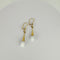 Boucles d'oreilles Boucles d’oreilles pendantes vintage en or jaune 14k et quartz blanc 58 Facettes 2508003
