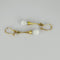 Boucles d'oreilles Boucles d’oreilles pendantes vintage en or jaune 14k et quartz blanc 58 Facettes 2508003