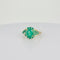 Bague 54 Bague vintage en or jaune 14 carats avec diamant et émeraudes 58 Facettes 2508023