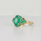 Bague 54 Bague vintage en or jaune 14 carats avec diamant et émeraudes 58 Facettes 2508023