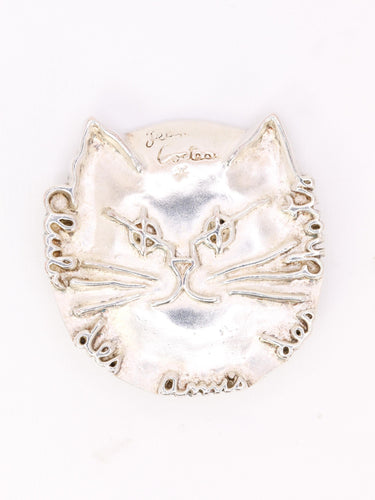 Broche JEAN COCTEAU Broche "Club des Amis des Chats" métal argenté 58 Facettes 1CA0000048/1
