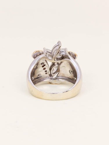 Bague 53.5 Bague fleur vintage en or blanc et rose 18 carats, diamants 58 Facettes 1211.9