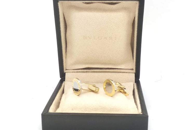 Boutons de manchette Bulgari - Boutons de manchette en or jaune 750 et acier 15 mm 58 Facettes 6454