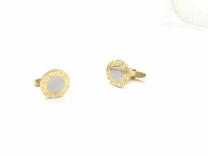 Boutons de manchette Bulgari - Boutons de manchette en or jaune 750 et acier 15 mm 58 Facettes 6454