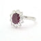Bague 59 Bague - Rubis ovale du Mozambique 1,63 ct et diamants en or blanc 18 ct 58 Facettes 8409