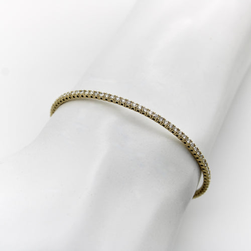 Bracelet Bracelet jonc flexible en or 14 carats et diamants 58 Facettes A2002R