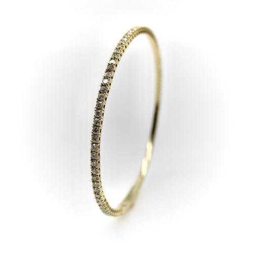Bracelet Bracelet jonc flexible en or 14 carats et diamants 58 Facettes A2002R
