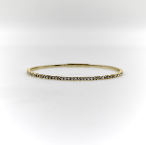 Bracelet Bracelet jonc flexible en or 14 carats et diamants 58 Facettes A2002R