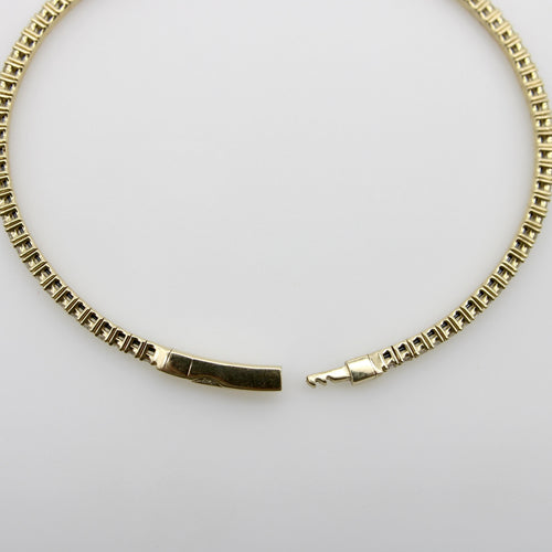 Bracelet Bracelet jonc flexible en or 14 carats et diamants 58 Facettes A2002R