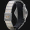 Montre Cartier Santos - Montre ronde octogonale en or jaune et acier 58 Facettes MT45167