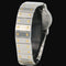 Montre Cartier Santos - Montre ronde octogonale en or jaune et acier 58 Facettes MT45173