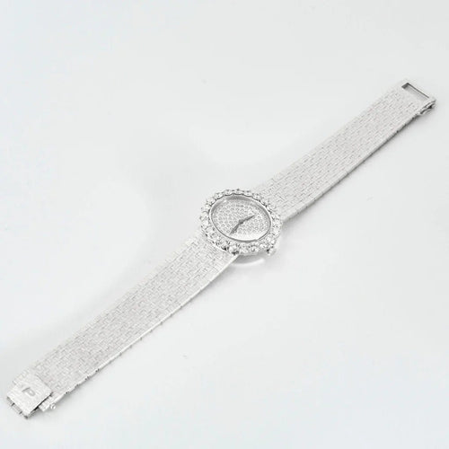 Montre PIAGET - Montre de dame, or blanc et diamants 58 Facettes 240716