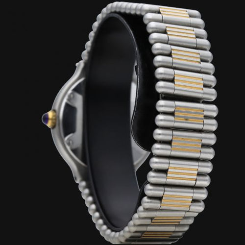 Montre Cartier Must 21 - Montre femme quartz en or jaune et acier 58 Facettes MT44972