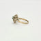 Bague 55 Bague motif floral en platine et or gris avec diamants et émeraude 58 Facettes 240356