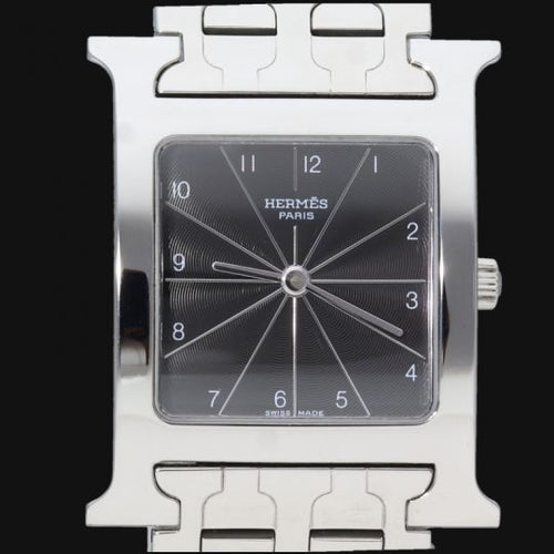 Montre Hermès Heure H - Montre en acier, cadran noir quartz 58 Facettes MT42230