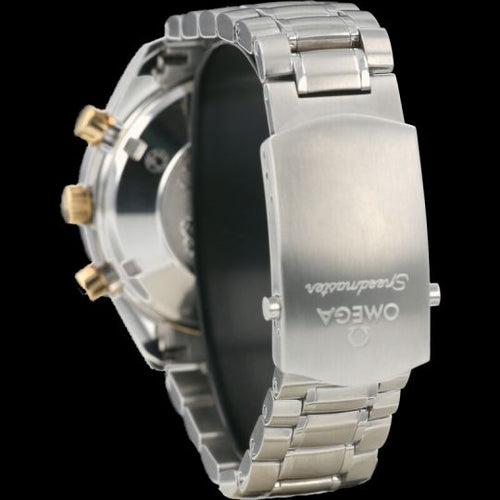Montre Omega Speedmaster - Montre chronographe Day-Date en or jaune et acier 58 Facettes MT41891