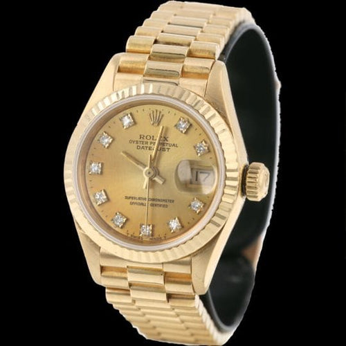 Montre Rolex Datejust - Montre Lady 26 mm en or jaune avec diamants 58 Facettes MT42418